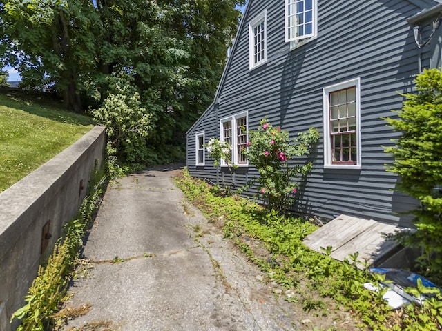 141 Centre St, Bath, ME 04530 - view of home's exterior with asphalt driveway