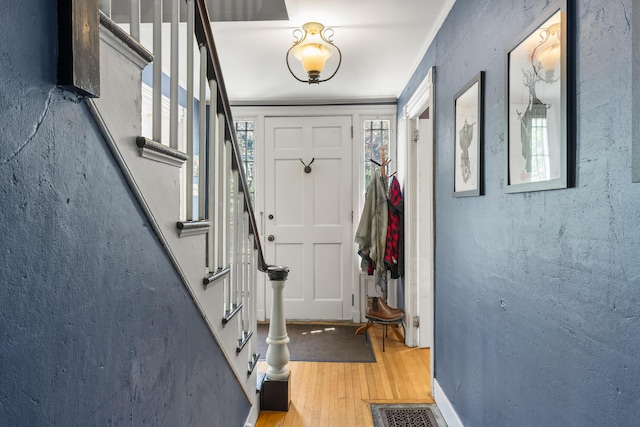 141 Centre St, Bath, ME 04530 - entryway with wood finished floors and stairs