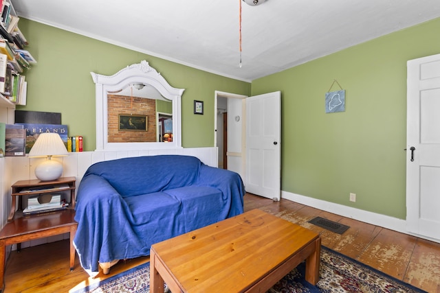 141 Centre St, Bath, ME 04530 - living area featuring wood finished floors and crown molding