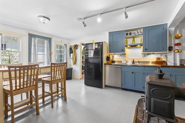141 Centre St, Bath, ME 04530 - kitchen featuring dishwasher, freestanding refrigerator, blue cabinets, and open shelves