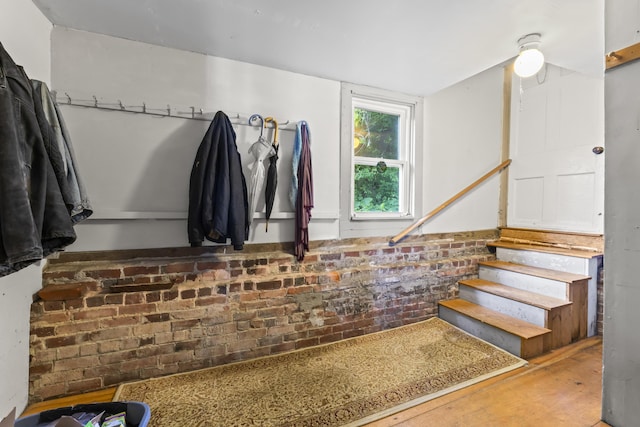 141 Centre St, Bath, ME 04530 - staircase with brick wall