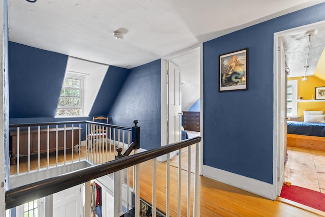 141 Centre St, Bath, ME 04530 - hall with an upstairs landing, wood finished floors, and vaulted ceiling