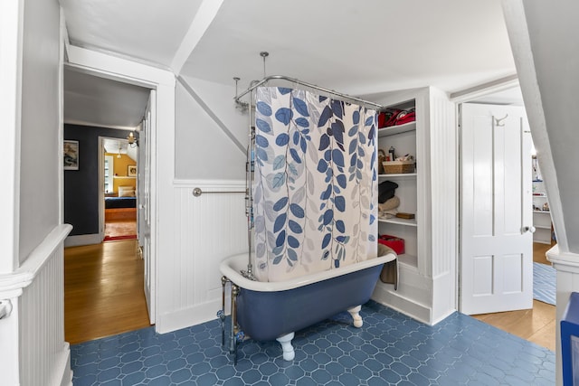 141 Centre St, Bath, ME 04530 - full bath featuring a soaking tub, wainscoting, and a shower with shower curtain