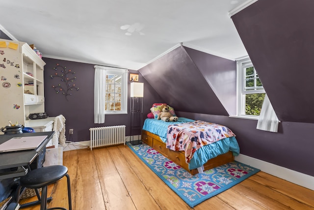 141 Centre St, Bath, ME 04530 - bedroom with radiator heating unit, wood-type flooring, crown molding, and vaulted ceiling