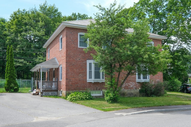 25 Oliver St, Bath, ME 04530 - view of property exterior featuring brick siding and a lawn