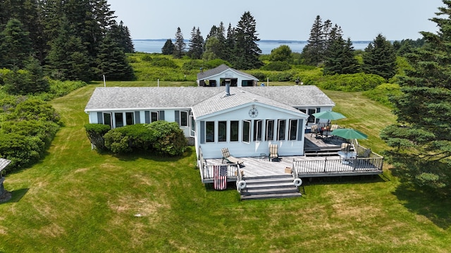 8 Bar Is, Tremont, ME 04674 - rear view of property featuring a wooden deck, a lawn, a shingled roof, and a view of trees