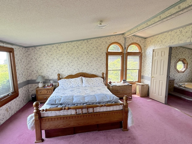 8 Bar Is, Tremont, ME 04674 - carpeted bedroom with wallpapered walls, vaulted ceiling, a textured ceiling, and crown molding