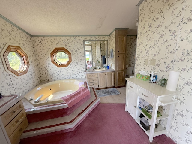 8 Bar Is, Tremont, ME 04674 - full bathroom with vanity, wallpapered walls, a tub with jets, crown molding, and tile patterned floors