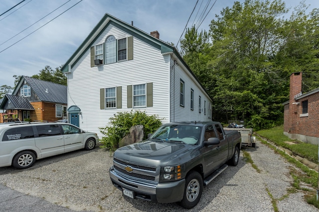 20 Elmwood Ave, Westbrook, ME 04092 - view of front of property with a chimney
