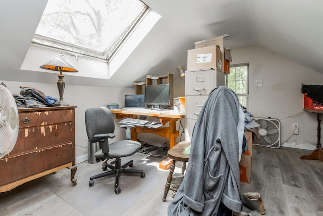 20 Elmwood Ave, Westbrook, ME 04092 - office with a skylight, vaulted ceiling, and wood finished floors