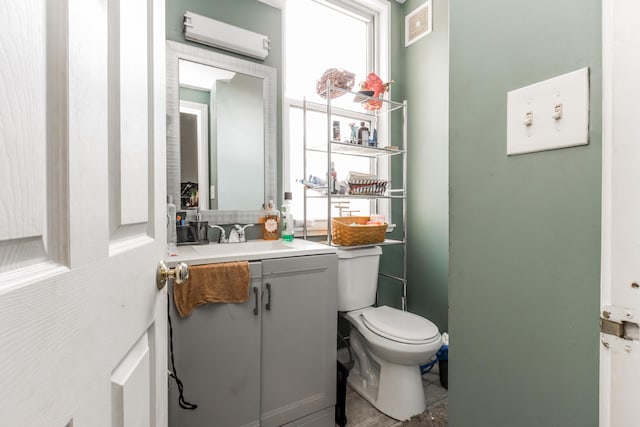 20 Elmwood Ave, Westbrook, ME 04092 - half bath with a wall unit AC and vanity