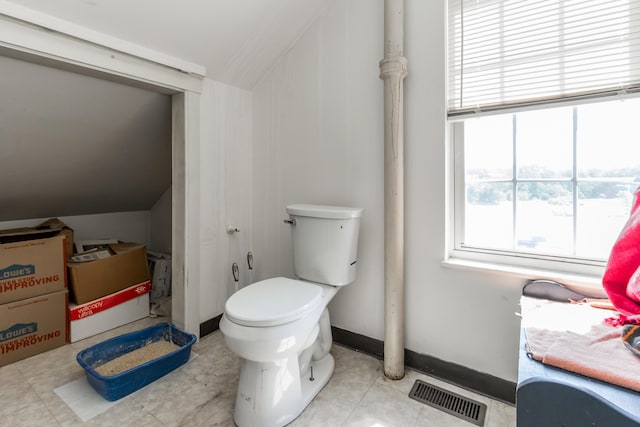 20 Elmwood Ave, Westbrook, ME 04092 - bathroom with toilet and vaulted ceiling