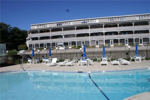 1801 Post Rd Unit 110, Wells, ME 04090 - community pool featuring a patio area