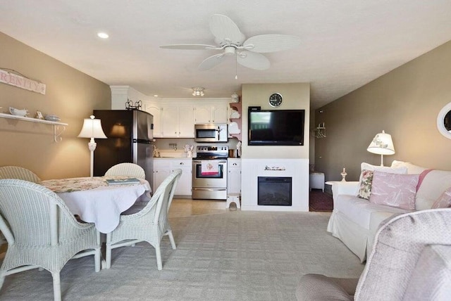 1801 Post Rd Unit 110, Wells, ME 04090 - living area with ceiling fan, light carpet, and recessed lighting