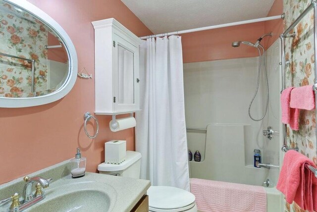 1801 Post Rd Unit 110, Wells, ME 04090 - full bathroom with shower / bathtub combination with curtain and vanity