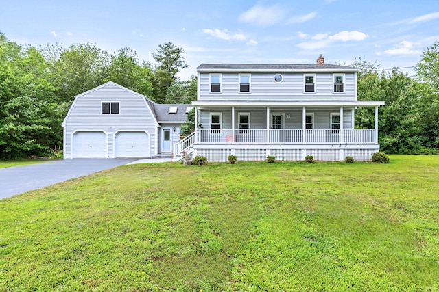 13 Wildbrook Dr, Biddeford, ME 04005 - view of front of house featuring a porch, a chimney, asphalt driveway, a front yard, and a gambrel roof