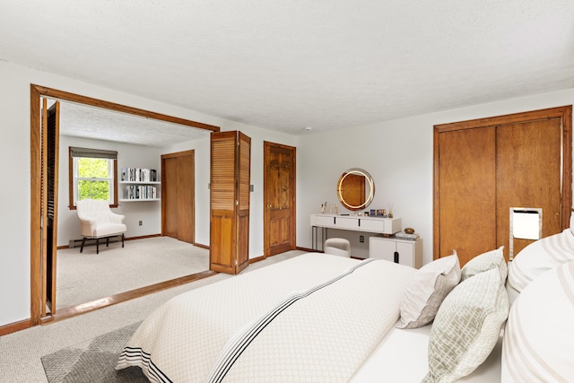 13 Wildbrook Dr, Biddeford, ME 04005 - bedroom featuring light colored carpet and multiple closets