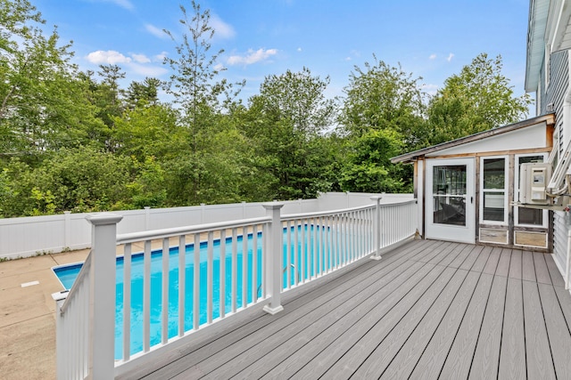 13 Wildbrook Dr, Biddeford, ME 04005 - wooden deck with a fenced backyard and view of scattered trees