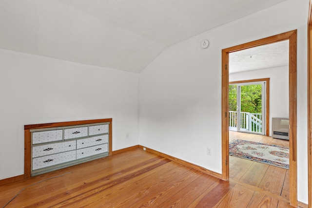 13 Wildbrook Dr, Biddeford, ME 04005 - bonus room featuring hardwood / wood-style floors and vaulted ceiling
