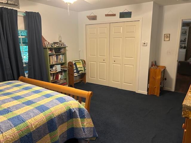 60 Dawes Rd, Dover-Foxcroft, ME 04426 - bedroom with dark carpet, a closet, and a ceiling fan