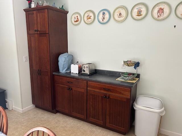 60 Dawes Rd, Dover-Foxcroft, ME 04426 - bar area with baseboards and a baseboard heating unit