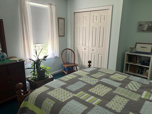 60 Dawes Rd, Dover-Foxcroft, ME 04426 - bedroom with a closet and carpet