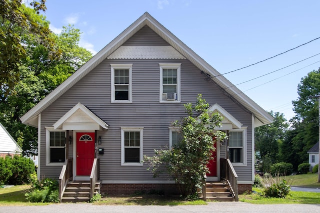 99 Gamage Ave, Auburn, ME 04210 - bungalow with entry steps and cooling unit