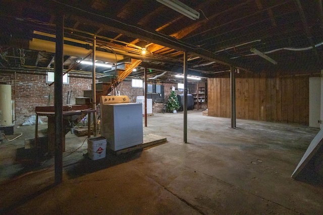 99 Gamage Ave, Auburn, ME 04210 - below grade area with washer / clothes dryer, gas water heater, and heating fuel
