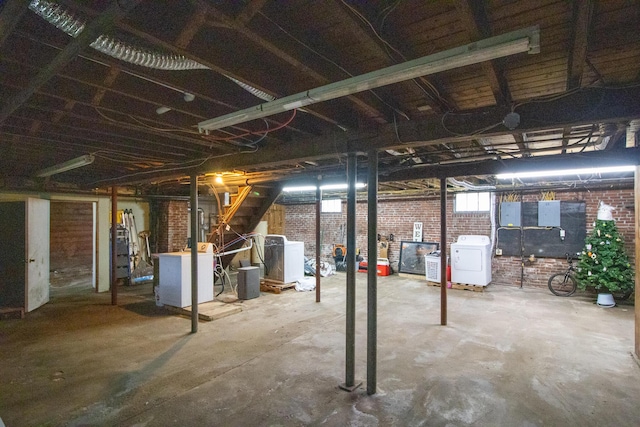 99 Gamage Ave, Auburn, ME 04210 - basement featuring washer / dryer and brick wall