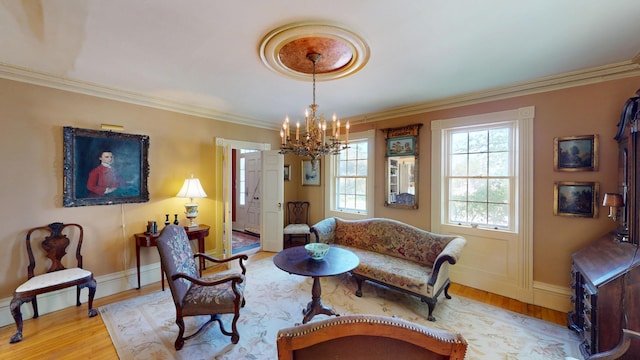 12 Center St, Machias, ME 04654 - living room featuring a chandelier, wood finished floors, and ornamental molding