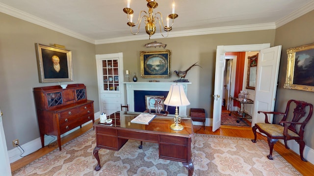 12 Center St, Machias, ME 04654 - office area featuring a chandelier, a fireplace, wood finished floors, and crown molding