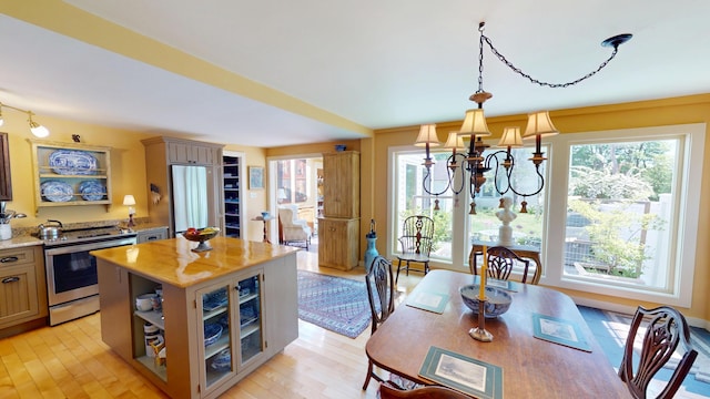 12 Center St, Machias, ME 04654 - dining space with a chandelier and light wood finished floors