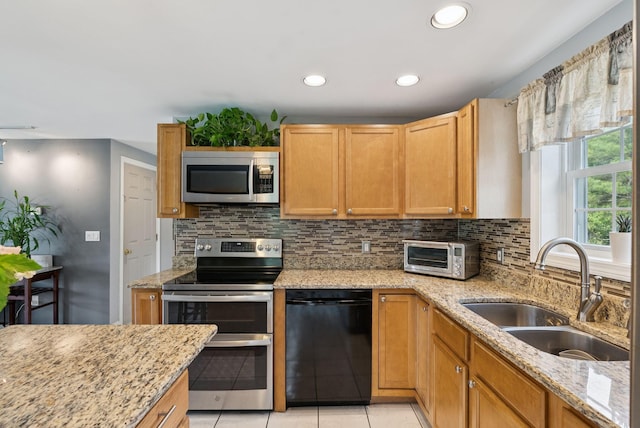 19 Straw Rd, Gorham, ME 04038 - kitchen featuring appliances with stainless steel finishes, decorative backsplash, recessed lighting, and light stone counters