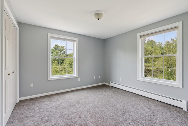 19 Straw Rd, Gorham, ME 04038 - unfurnished bedroom featuring baseboard heating, multiple windows, and carpet flooring