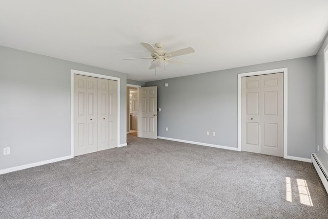 19 Straw Rd, Gorham, ME 04038 - unfurnished bedroom featuring carpet flooring, two closets, a ceiling fan, and a baseboard heating unit
