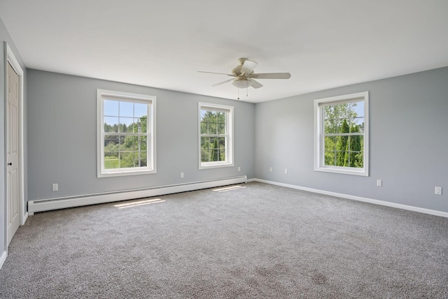 19 Straw Rd, Gorham, ME 04038 - empty room featuring a baseboard heating unit, healthy amount of natural light, ceiling fan, and carpet flooring