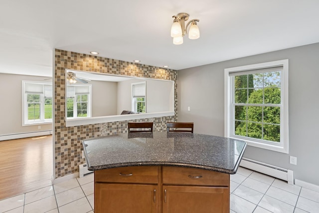 19 Straw Rd, Gorham, ME 04038 - kitchen with baseboard heating, light tile patterned floors, and recessed lighting