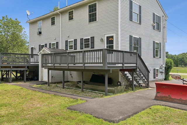 19 Straw Rd, Gorham, ME 04038 - rear view of house featuring a wooden deck, a lawn, and stairs