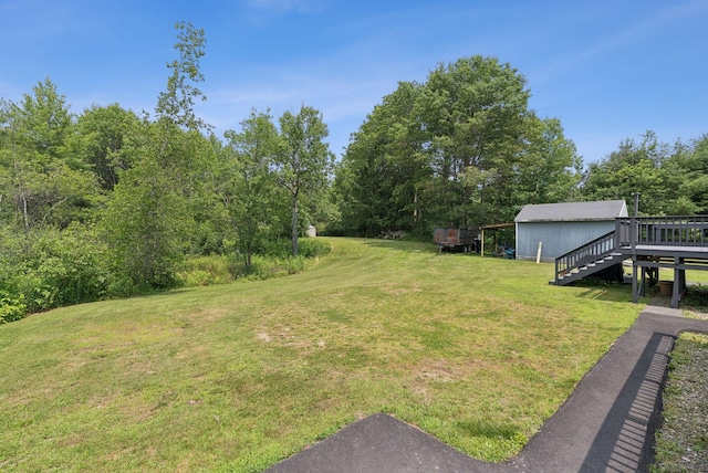19 Straw Rd, Gorham, ME 04038 - view of grassy yard with a deck and stairway