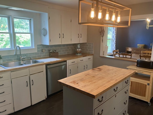 16 N Main St, Morrill, ME 04952 - kitchen with wooden counters, dishwasher, white cabinets, and decorative backsplash