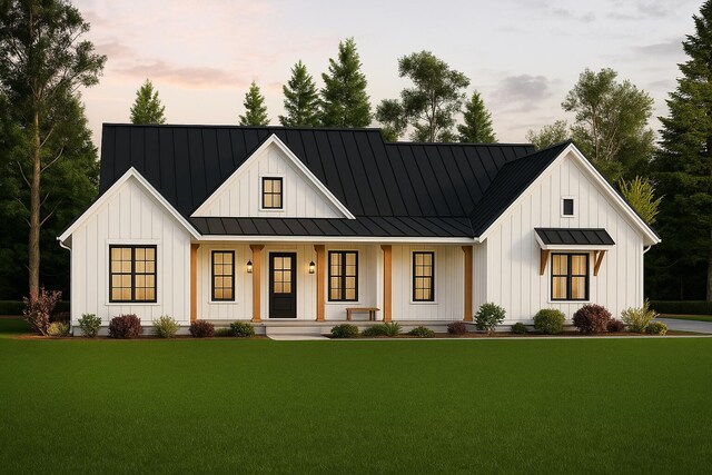 2 Moxie Ln, Biddeford, ME 04005 - modern farmhouse style home with a standing seam roof, board and batten siding, covered porch, and a metal roof