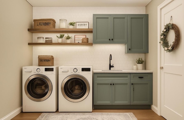 2 Moxie Ln, Biddeford, ME 04005 - washroom featuring cabinet space, washer and clothes dryer, and light wood-style floors