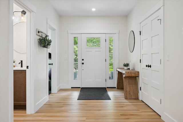 27 Meadow View Dr, Readfield, ME 04355 - foyer entrance with light wood-style floors and recessed lighting