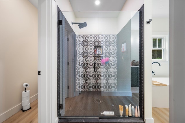 27 Meadow View Dr, Readfield, ME 04355 - bathroom with wood finished floors and a tile shower