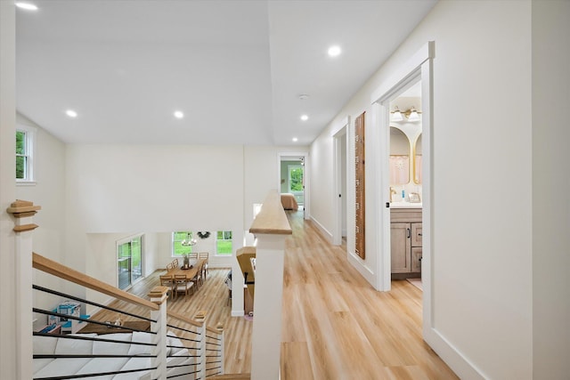 27 Meadow View Dr, Readfield, ME 04355 - corridor featuring light wood-type flooring, recessed lighting, and an upstairs landing