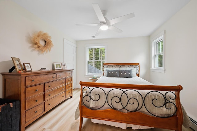27 Meadow View Dr, Readfield, ME 04355 - bedroom with light wood-style floors and a ceiling fan