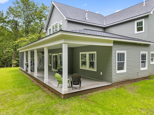 27 Meadow View Dr, Readfield, ME 04355 - back of property with a lawn, roof with shingles, a deck, and a patio area