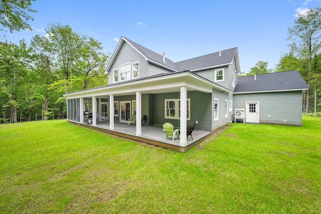 27 Meadow View Dr, Readfield, ME 04355 - back of house featuring a yard, roof with shingles, and a patio