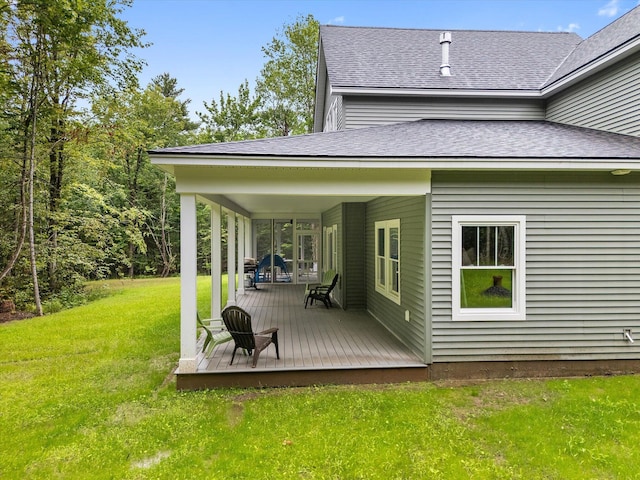 27 Meadow View Dr, Readfield, ME 04355 - back of property featuring a lawn, roof with shingles, and a wooden deck