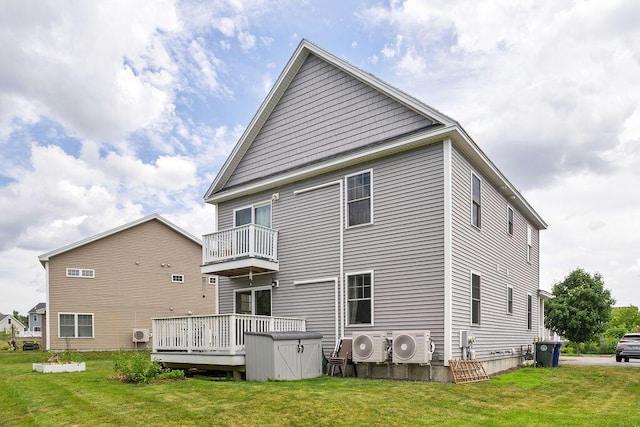 136-138 Blue Spruce Farm Rd, Westbrook, ME 04092 - rear view of house featuring a balcony, a lawn, and a wooden deck